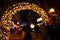 Defocused blur light arch background of Christmas market