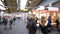 Defocused blur of people silhouettes at international fair exhibition