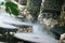 Defocused and blurred image for background. Hot Springs, Boiling and steaming water in geyser vent. Steaming geothermal hot water