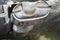 Defocused blurred view of car muffler. Car exhaust pipe