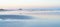 Defocused blurry background image oceanbeach long view in soft tones