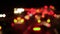 Defocused blurry street night traffic lights, view from inside the car