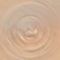 Defocused creamy toffee brown beige colors golden vortex or whirl effect, spiral circle wave with abstract water