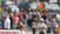 Defocused crowd of people, road intersection crosswalk on The Strip of Las Vegas, USA. Anonymous blurred pedestrians on