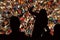 Defocused crowd of spectators on a stadium tribune