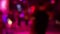 Defocused dancing scene in the night club