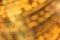 Defocused golden horizontal Lighting bokeh abstract background