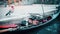 Defocused gondolier awaits gondola passengers in Venice, Italy