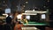 Defocused group of people playing pool or billiards in bar or pub after pandemic