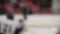 Defocused hockey players skating on rink, playing important match, background