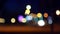 Defocused lights of moving cars. Night Traffic in the city with blurred motion. The bokeh effect. Light car bokeh moving