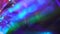 Defocused metallic gold, dark blue and purple light leaks. Festive neon abstract holographic modern background for party