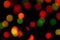 Defocused multicolored christmas lights isolated on black