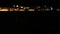 Defocused night city lights in the distance