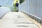 Defocused of People Walking on Embankment on Chao Phraya River at Saphan taksin Bridge