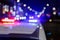 defocused photo of police car lights in night city with selective focus and bokeh