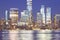 Defocused picture of New York City night skyline, abstract urban background, color toning applied, USA