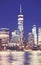 Defocused picture of New York City night skyline, abstract urban background, color toning applied, USA