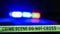 Defocused police car siren with boundary tape