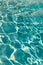 defocused pool water blured background with ripples. defocused pool ripple water