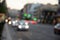 Defocused receding city traffic in the evening. Out of focus lights of traffic jam on city street. City blur background. Moving