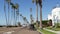 Defocused road with palm trees in California, tropical ocean beach. Los Angeles Hollywood aesthetic.