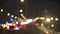 Defocused road in shanghai, traffic lights nighttime