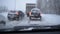 Defocused scene with cars in snow