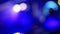 Defocused scene in the night club with bokeh lights