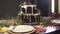 Defocused shot of delicious Christmas dinner table gingerbread cake in New Year eve cozy decoration festive atmosphere