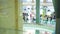 Defocused silhouettes of people having lunch at fast food cafe in shopping mall