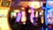 Defocused slot machines glow in casino on fabulous Las Vegas Strip, USA. Blurred gambling jackpot slots in hotel near