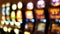 Defocused slot machines glow in casino on fabulous Las Vegas Strip, USA. Blurred gambling jackpot slots in hotel near Fremont