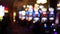 Defocused slot machines glow in casino on fabulous Las Vegas Strip, USA. Blurred gambling jackpot slots in hotel near Fremont