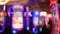 Defocused slot machines glow in casino on fabulous Las Vegas Strip, USA. Blurred gambling jackpot slots in hotel near Fremont