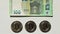 Defocused slow motion video of bitcoin on banknotes of one hundred euro. Exchange euro for bitcoin. Cryptocurrency on