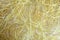 Defocused texture tangled yellow thread