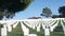 Defocused tombstones, american military memorial cemetery, graveyard in USA.