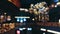 Defocused view of Christmas holidays decoration inside modern shopping mall, background and illumination