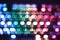 Defocused view of rainbow color backlighted gaming computer keyboard