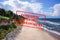 Defocused view of sandy beach and sea, empty and closed due to coronavirus with Polish notice Closed due to Coronavirus