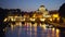 Defocused view of Sant Angelo bridge over river near Vatican City