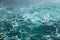 Defocused water background - whirlpool waves, blue tint. Abstract background with liquid fluid texture. Niagara river