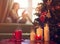 Defocusing girl sitting on the window and reading book