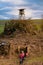 Deforestation scene with a wooden hunting tower in rural landscape