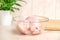 Defrosted raw chicken fillet in glass bowl. Fresh raw chicken breast for cooking chopped chicken cutlets. Glass bowl and