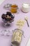 Defrosting berries in bowl. Oatmeal in glass jar