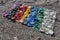 Degraded still life of plastic caps and different plastic pieces found on the beach