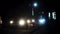 Dehradun Night Traffic: Rajpur Road Illuminated with Approaching Headlights - Stock Footage