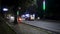 Dehradun Night Traffic: Rajpur Road Illuminated with Approaching Headlights - Stock Footage